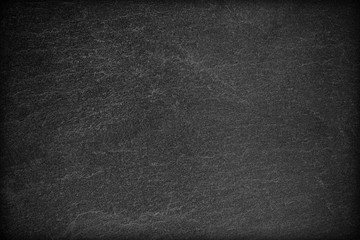 Dark grey black slate background or texture. © peekeedee