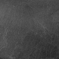 Dark grey black slate background or texture.