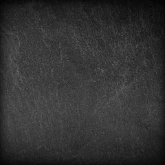 Dark grey black slate background or texture.