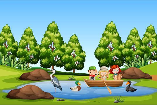 Children paddle boat in the lake