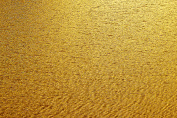 Gold abstract background or texture and gradient shadow.
