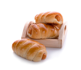 Sausage in dough .Isolated on white background