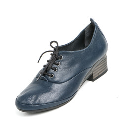 Women's leather platform shoes isolated on white background