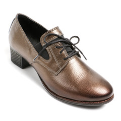 Women's leather platform shoes isolated on white background