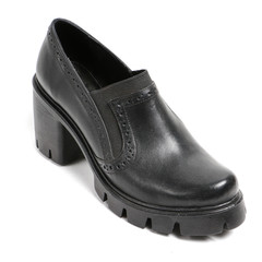 Women's leather platform shoes isolated on white background