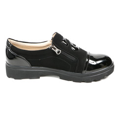 Women's leather platform shoes isolated on white background