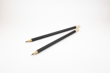Black pencil on white background