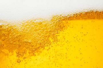 Beer background with bubble froth texture foam pouring alcohol soda in glass happy celebration party holiday new year concept object design