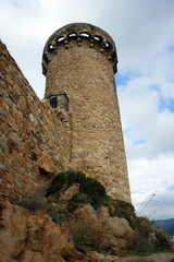 Spain.Tossa de Mar.One of the well-preserved towers of the fortress.