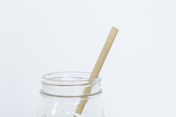 Bamboo straw in glass.