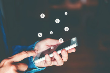 Online banking businessman using smartphone with credit card Fintech and Blockchain concept