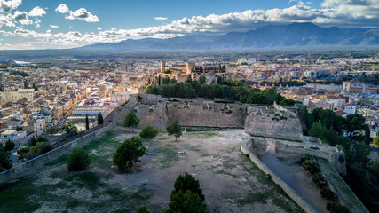 Fototapeta na wymiar Aerial view of medieval Tortosa in Spain with cathedral, castle and the Ebro river
