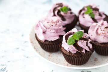 Chocolate cupcake with blueberry cheese cream 