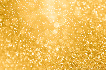 Gold glitter sparkle glam background texture for golden Christmas sparks, wedding anniversary or birthday - obrazy, fototapety, plakaty