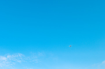 Passenger liner in the blue sky