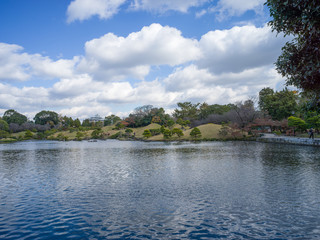 Clear sky and fish pond