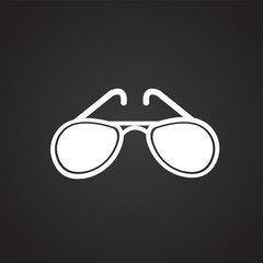 Sunglasses on black background icon