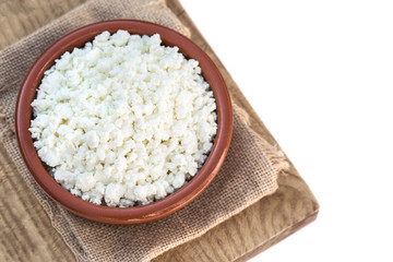 Organic Cottage cheese isolated on a white background, top view