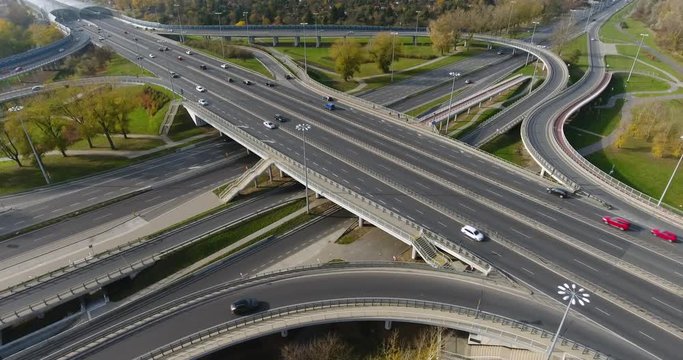 Aerial Wide View Of Traffic In Rush Hours On A Highway Interchange