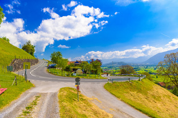 Curved road in Alps village, Grabs, Werdenberg, St. Gallen, Swit