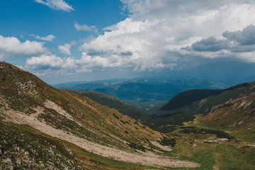 Bright rolling countryside around a farm in the morning light. Picturesque day and gorgeous scene. Location place Carpathian, Ukraine, Europe. Concept ecology protection. Explore the world's beauty.