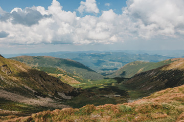 Fototapeta premium Great view of the alpine valley that glowing by sunlight. Picturesque and gorgeous morning scene. Popular tourist attraction. Location place Carpathian, Ukraine, Europe. Artistic picture. Beauty world