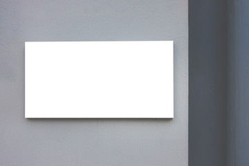 Mock up. Blank billboard outdoors, outdoor advertising, public information board on gray wall.