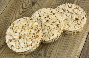 Crunchy crispbread on a wooden background. Healthy snack.