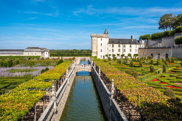 Cascade canal in the middle of beautiful renaissance park with chateau Villandry on the background, Loire region, France.