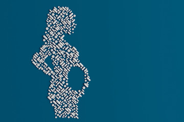 Many pills scattered on a blue background in the form of a silhouette of a pregnant woman 3D illustration