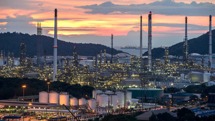 Beautiful sunset  petrochemical oil refinery factory plant cityscape of Chonburi province at night  , landscape Thailand