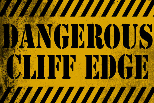 Dangerous cliff edge sign yellow with stripes
