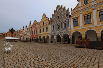 Obraz premium Picturesque medieval buildings on the main square of Telc. Famous touristic place and travel destination in Czech Republic. A UNESCO world heritage site. Telc, Southern Moravia, Czech Republic