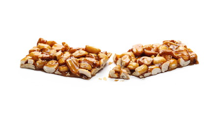 Caramel peanut bar isolated on white background
