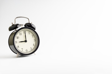 Alarm clock isolated on white background with selective focu