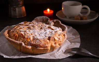 homemade almond frangipane cake in selective lighting