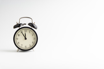 Alarm clock isolated on white background with selective focu