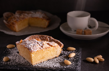 homemade almond frangipane cake in selective lighting