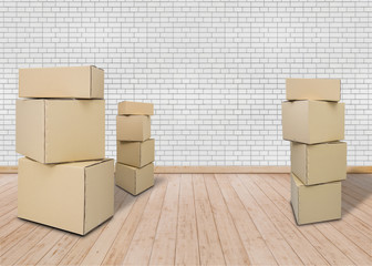 Moving in new home. Empty room with Carton boxes