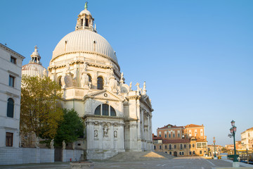 Fototapeta na wymiar Cathedral of Santa Maria della Salute close up on a September morning. Venice, Italy