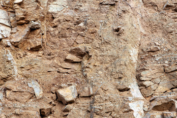 wall in the quarry, extraction of sand, gravel, background