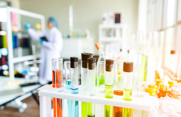 image of scientist or student with equipment and science experiments on laboratory,microscope for chemistry biology test samples,examining liquid,Scientific,healthcare research concept,blur,copy space