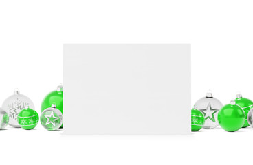 Blank Christmas card laying on green and white baubles isolated 3D rendering