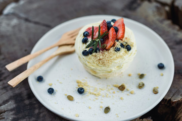 Strawberry and blueberry cake with pumpkin seed