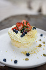 Strawberry and blueberry cake with pumpkin seed