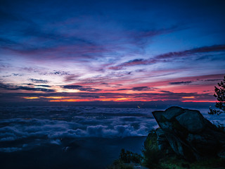 Beautiful Sunrise Sky with Rocky cliff in the morning on Khao Luang mountain in Ramkhamhaeng National Park,Sukhothai province Thailand