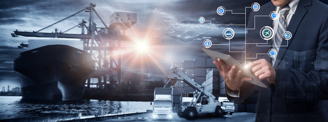 Businessman is pressing button on touch screen interface in front Logistics Industrial Container Cargo freight ship for Concept of fast or instant shipping, Online goods orders worldwide