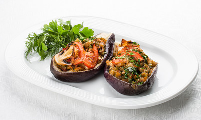Aubergine are stuffed by vegetables and mushrooms