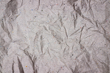 Crumpled greywrapping  paper texture. 