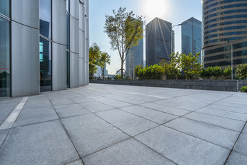 Panoramic skyline and buildings with empty square floor.